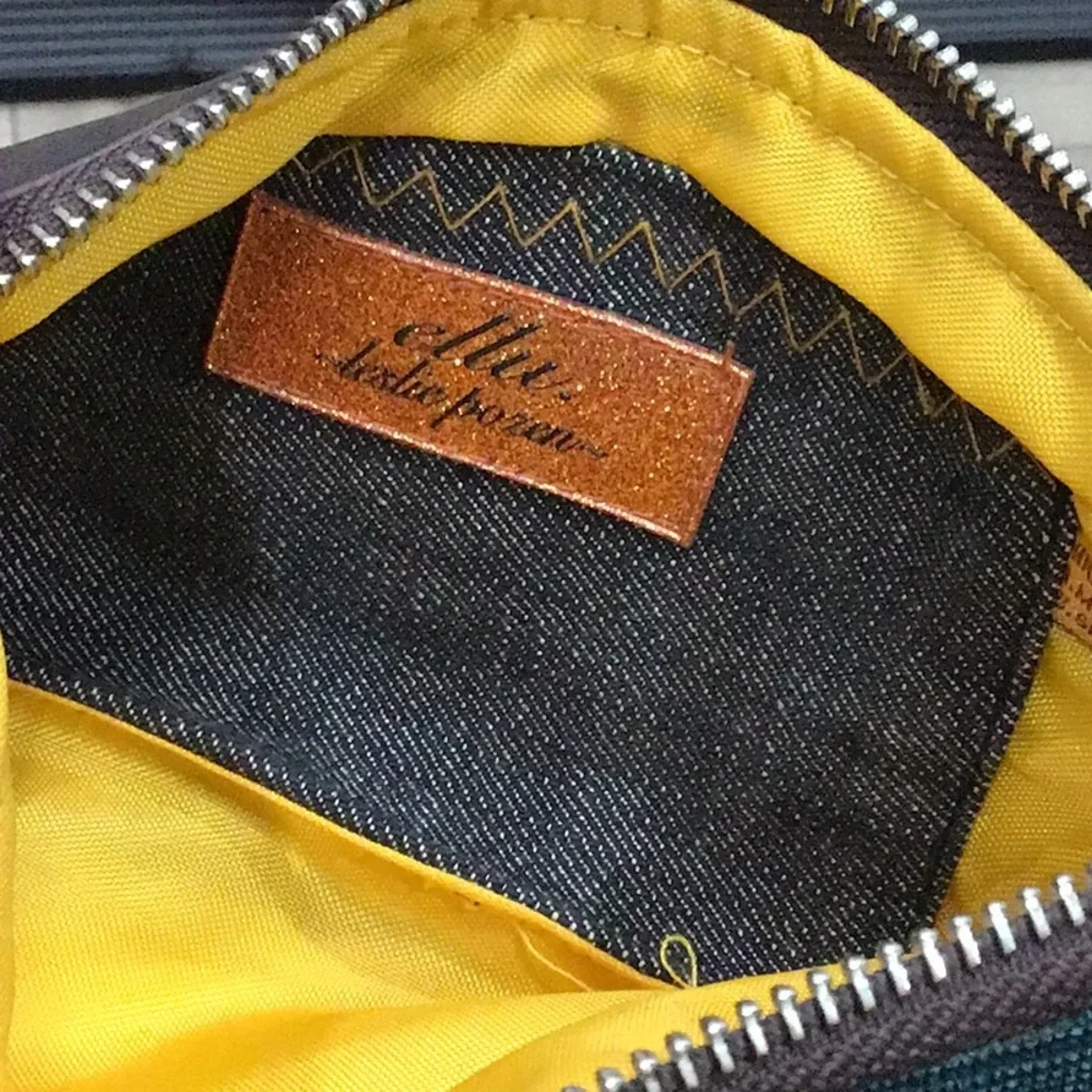 Ellu by Leslie Pozen Teal & Multicolored Coated Canvas Wristlet
